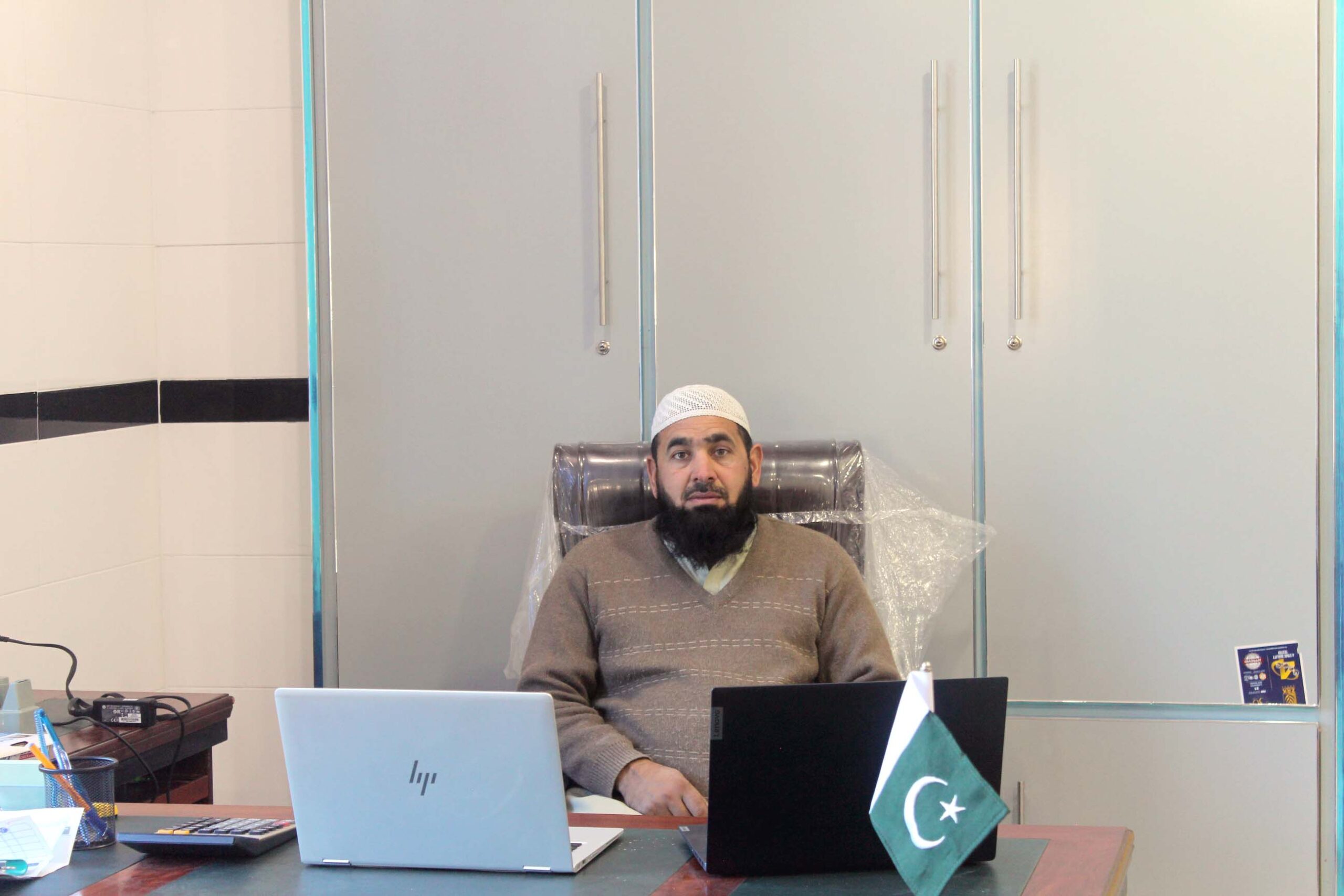 Hospital administrator at office desk