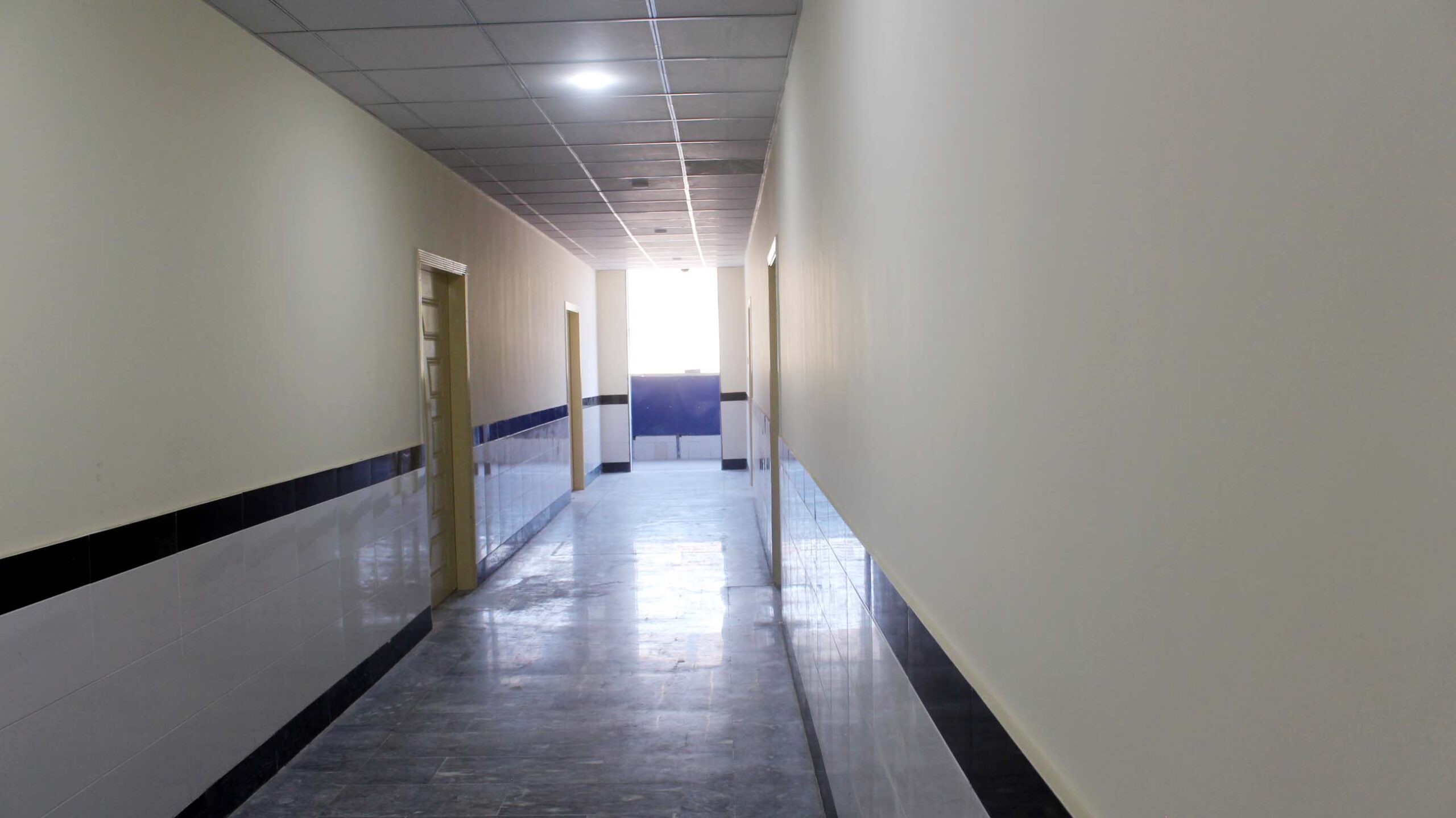 Hospital corridor and patient rooms